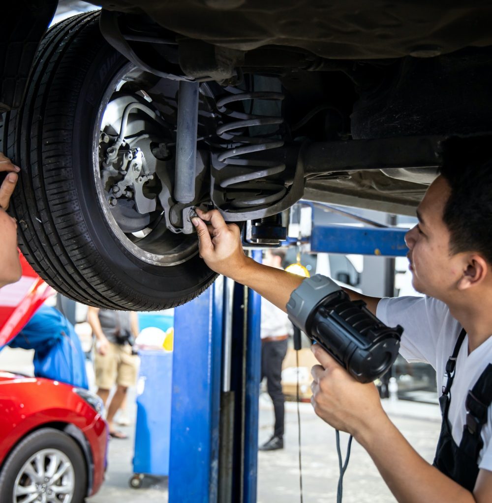 two-mechanic-was-checking-the-car-suspension-q45aq93j1d6t1a49rd1o76mpwjk1ap2ve9mkvll91c.jpg